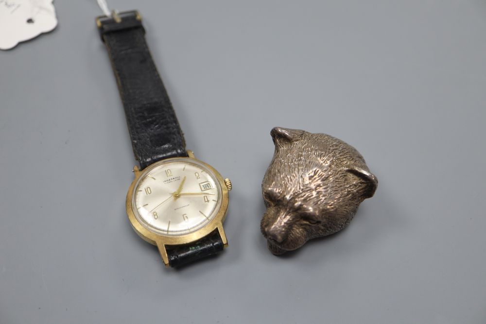 A silver pill box, cast as a tigress head import marks from London 1995 and an Ingersoll rolled gold wristwatch